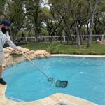 Do I drain my pool water after it rains?